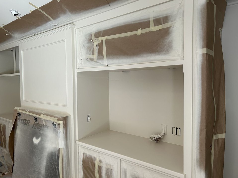 Built-in cabinetry refinished to a factory-smooth finish