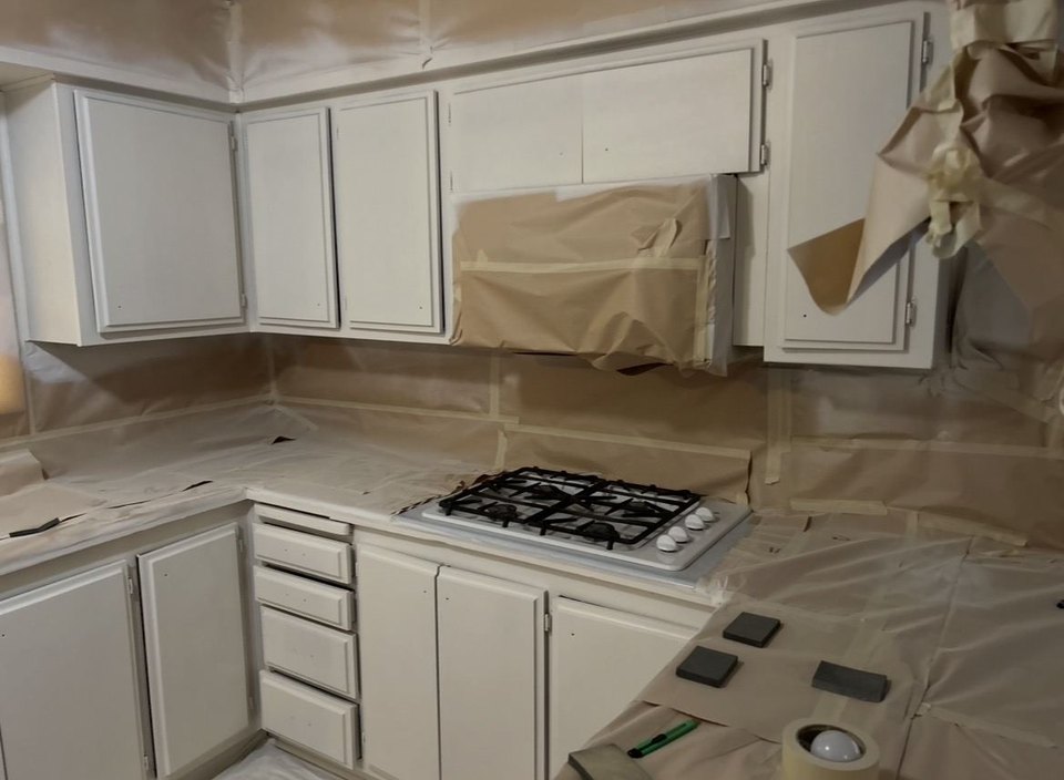 Cabinet refinishing prep — masking and surface protection
