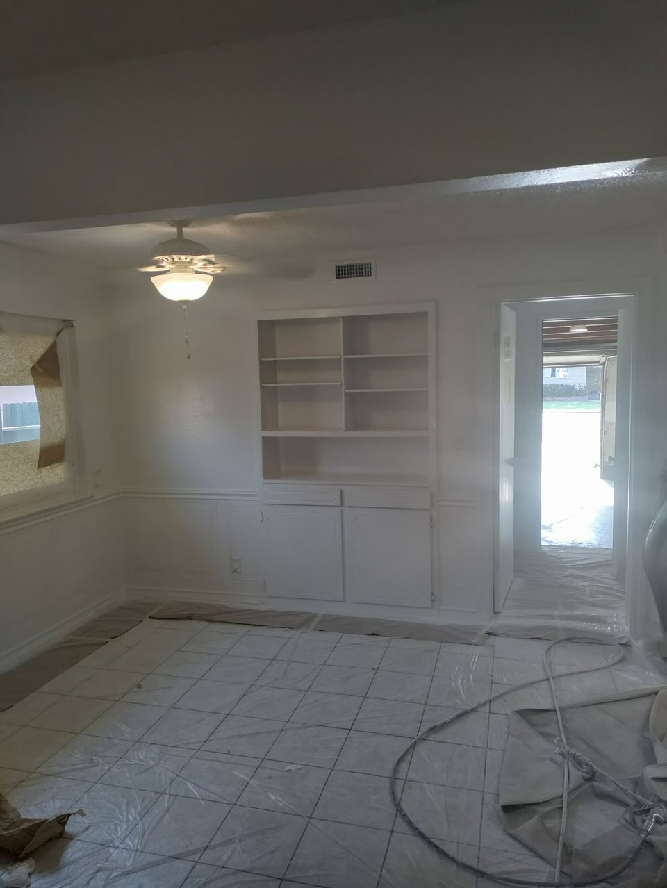 Dining room with painted built-in cabinetry